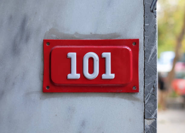 istock Red house number 101 on the wall 1304235599