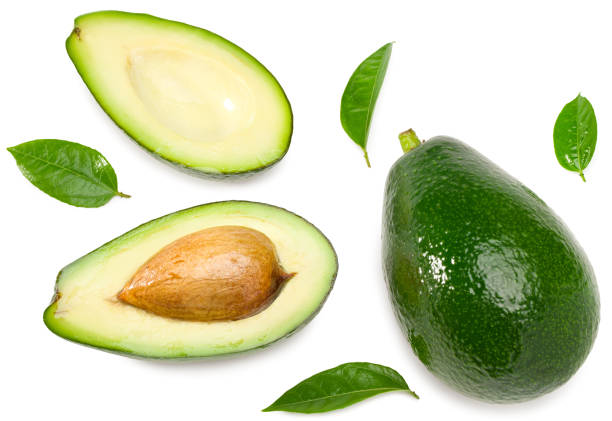 istock fresh avocado with slices isolated on white background. top view. clipping path 1304235720