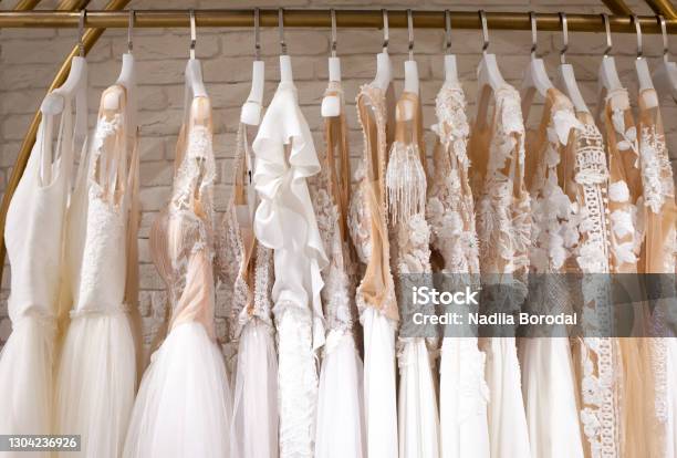 Many Beautiful Wedding Dresses Hang In The Store Stock Photo - Download Image Now - Wedding Dress, Sale, Model - Object