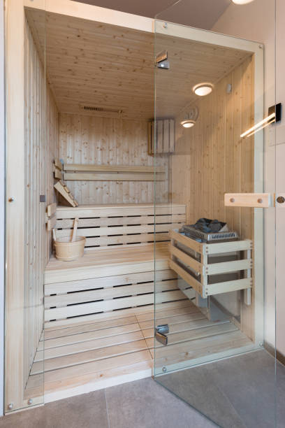istock Small sauna cabin in modern bathroom 1304237000