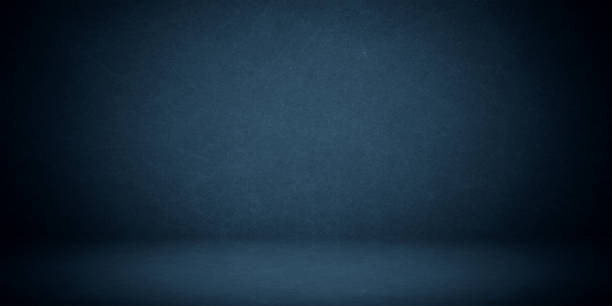 istock Empty blue grunge color studio room background, can use for background and product display 1304239407