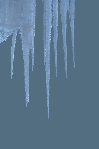 istock Spring background with icicles melting in the sun 1304239417