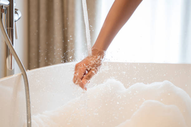 istock Woman feeling excited before having foamy bath 1304242214