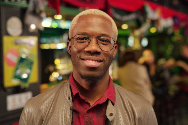 istock African man in the pub 1304242625