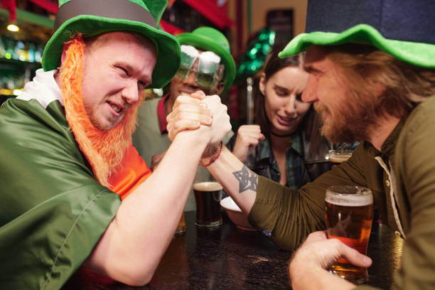 istock Arm wrestling during the holiday 1304242637