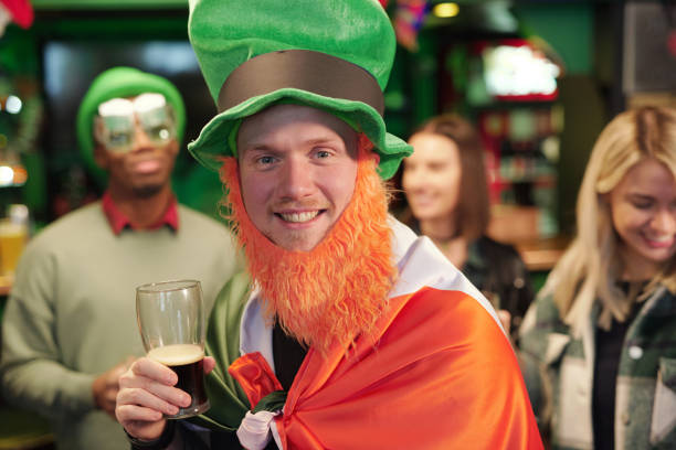 istock Man with beer celebrating Patricks Day 1304242640