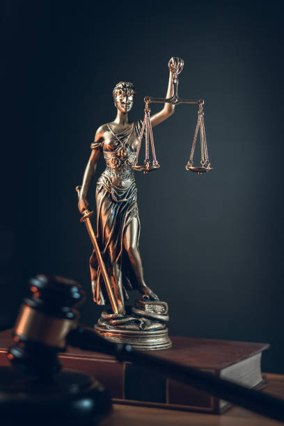 istock lady justice with judge gavel in front 1304243725