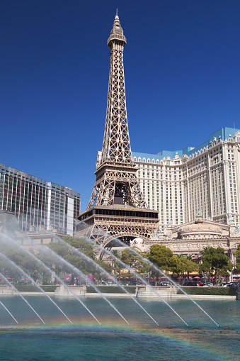 Las Vegas, Nevada - August 30, 2019: Eiffel Tower at Paris las Vegas and the Fountains of Bellagio in Las Vegas, Nevada, United States.