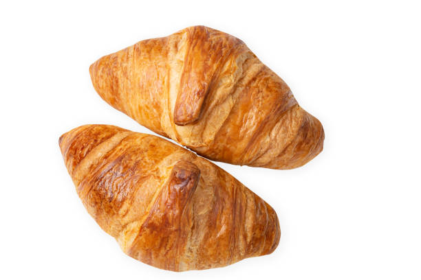 istock Croissants isolated on white background, clipping mask 1304247430