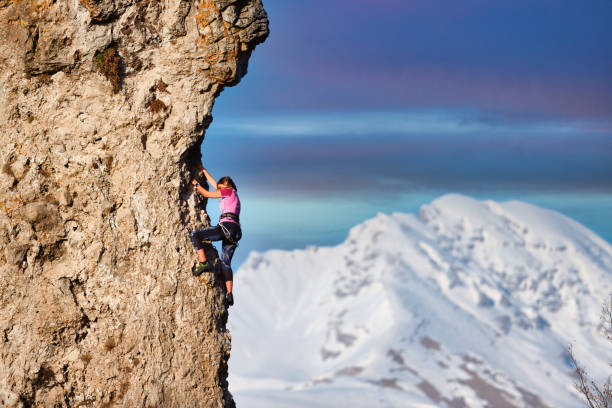 A young girl mountaineer during a climb