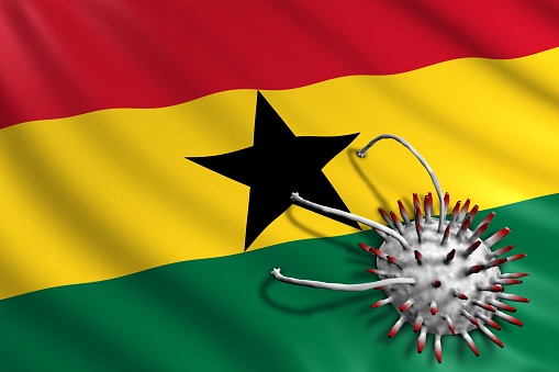 Ghanaian Flag attacked by Covid-19 Virus. Pandemic Corona Virus Concept