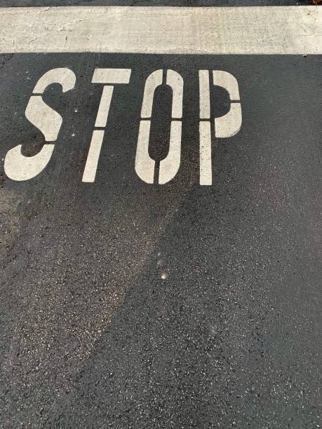 istock Stop sign on street 1304248559