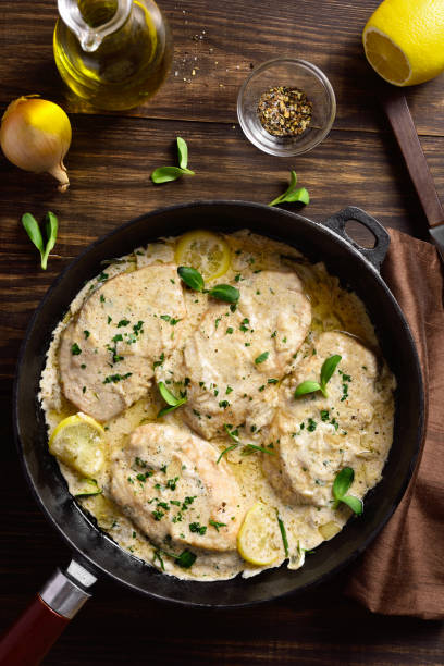istock Chicken breast in creamy garlic sauce 1304248657