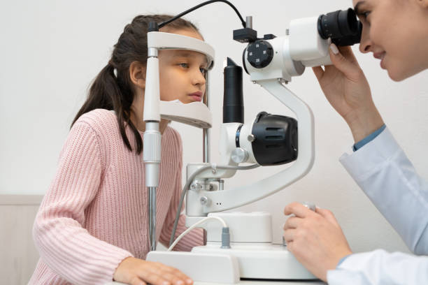 istock Little girl having her eyesight checked with modern opthalmological equipment 1304249101