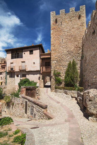 istock Cobblestone Passage next to the Walls in Albarracin 1304250305