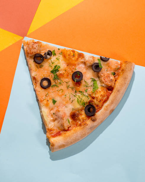 istock Pizza slice triangle on a colored bright background. Concept for pizzerias 1304258081