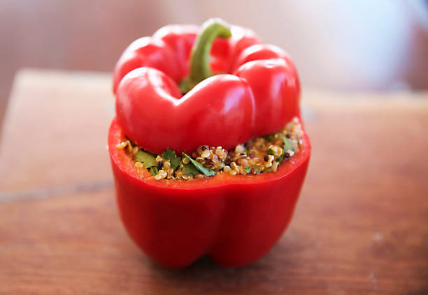 istock Stuffed vegan red bell pepper, Ca 1304258832