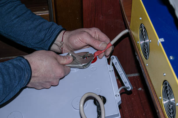 istock Installation of an accumulator for a home uninterruptible power supply. Battery replacement process. 1304260496