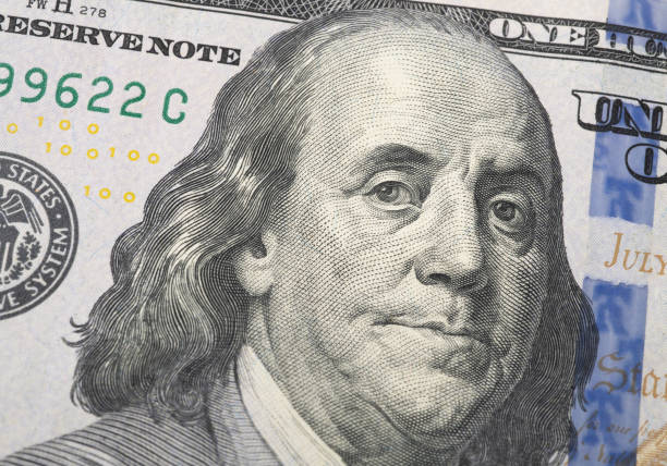 Closeup of a hundred dollars bill showing Benjamin Franklin Closeup of a hundred dollars bill showing Benjamin Franklin. us currency stock pictures, royalty-free photos & images