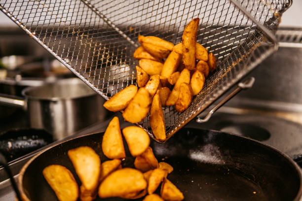 Tasty crunchy potatoes in plate.