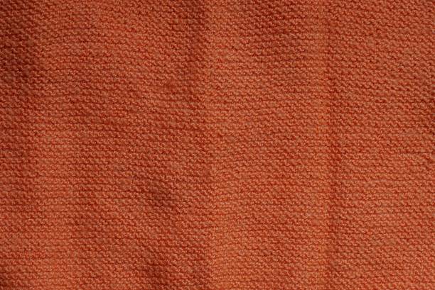 istock orange fabric texture from a piece of wool 1304262317