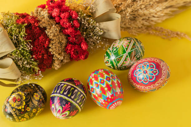 Easter eggs and colorful palm tree stock photo