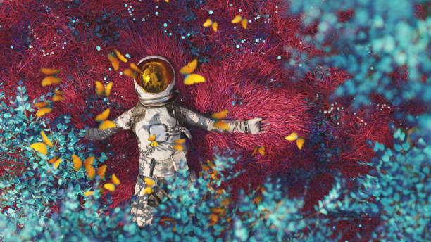Astronaut resting on an alien planet An astronaut surrounded by butterflies is resting in an alien garden cosmonaut photos stock pictures, royalty-free photos & images