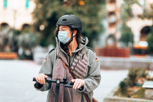 istock Portrait of a woman using the scooter during the lockdown 1304268930