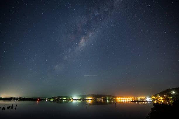 istock Stars and milky way waterscape 1304269766