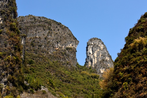 China - East Asia,Guilin,Yangshuo county,\nGuilin karst has been included in the world heritage list.\nKarst landform scenery along the Li River,From Guilin to Yangshuo,It is 63 km in length.\nThese are some of the strange peaks seen on a cruise ship.
