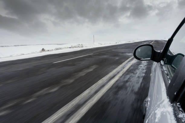 istock Car on the snowy road 1304272478