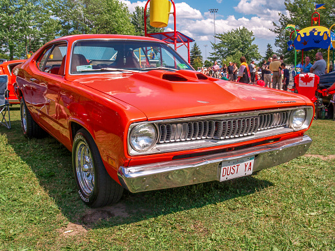 Moncton, New Brunswick, Canada - July 14, 2007 : 1971 Plymouth Duster parked in Centennial Park during 2007 Atlantic Nationals, Moncton, NB, Canada.