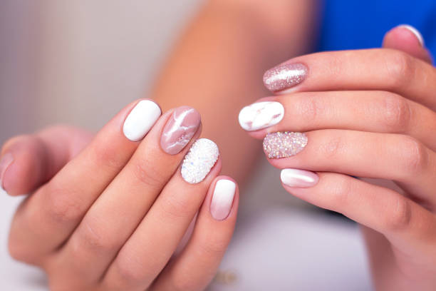 istock Female hands with luxury manicure nails 1304281300