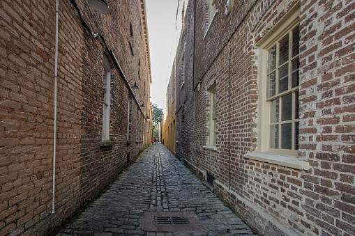 Lodge Alley in Charleston, South Carolina is one of city's few remaining cobblestone streets. Charleston is famous for it's hidden and secret alleyways and this one dates back to the early 1700s.