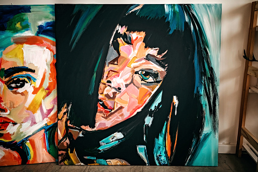 Paint of female face, acrylic paint