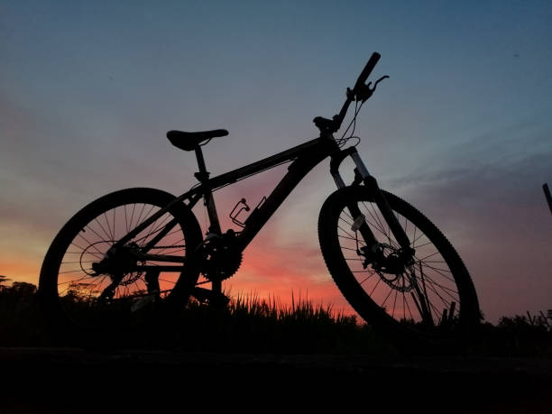 istock mountain bike with sunset beground 1304291040
