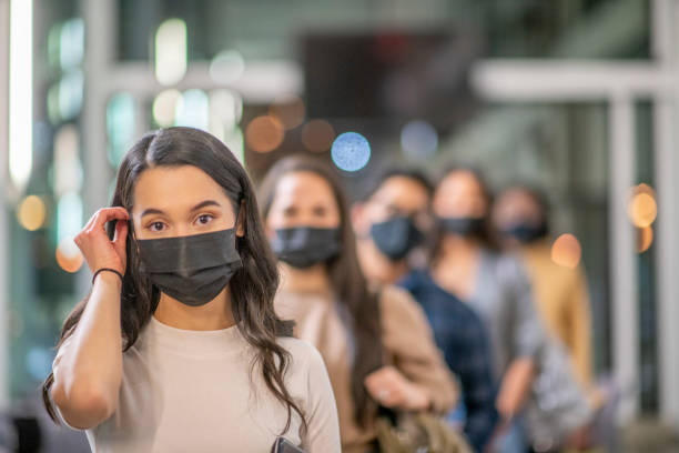istock Normalize Wearing A Mask On Campus Stock Photo 1304293593