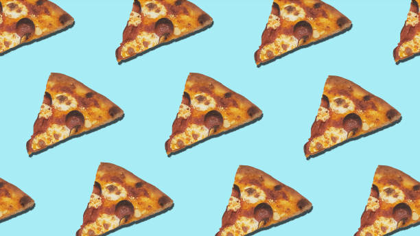 istock Pizza Slices on Light Blue Background 1304295153