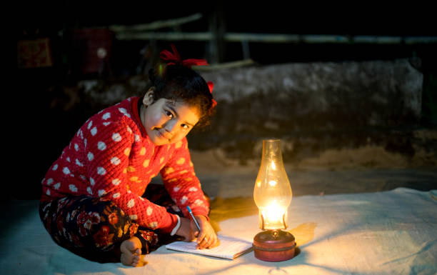 istock Rural girl studying at village 1304301868