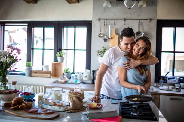 istock Loving couple cooking together 1304304958