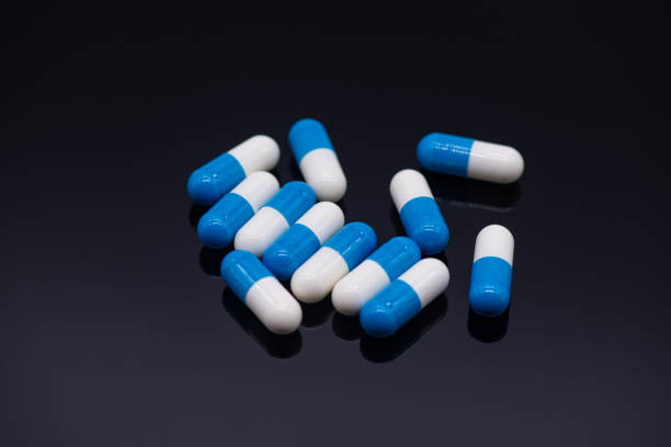 istock Pills in blue and white capsules 1304315258