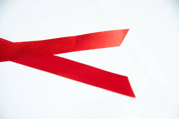 istock Close up red ribbon on white background. 1304315262