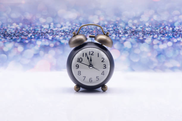istock Retro alarm clock on a festive background 1304316166