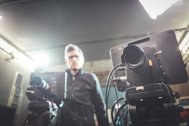 istock Cameraman operates a film camera, broadcasting recording studio 1304319251