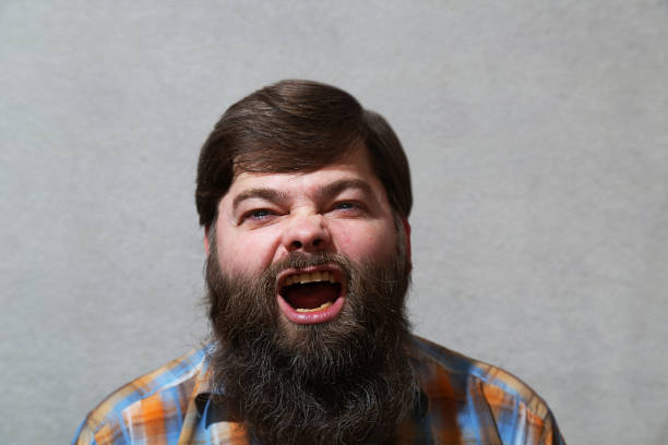 istock Portrait. A man with a long beard and an open mouth. 1304320988