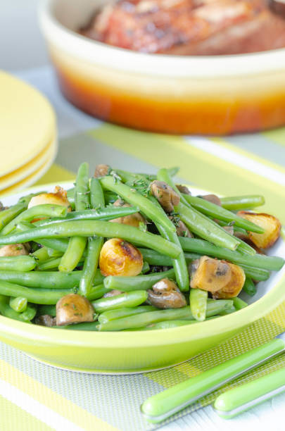 istock Sauteed green beans with caramelized onions and mushrooms 1304326064