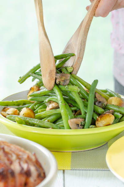 istock Sauteed green beans with caramelized onions and mushrooms 1304326300