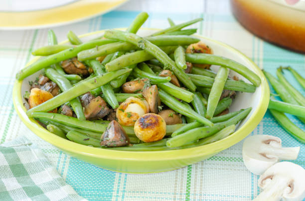 istock Sauteed green beans with caramelized onions and mushrooms 1304326570