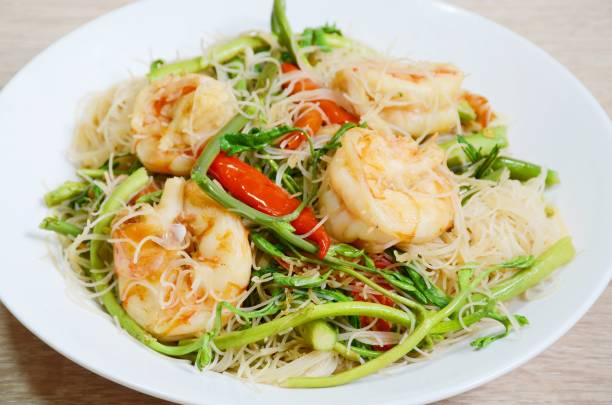 istock Stir-fried rice vermicelli & water mimosa with prawns 1304326679