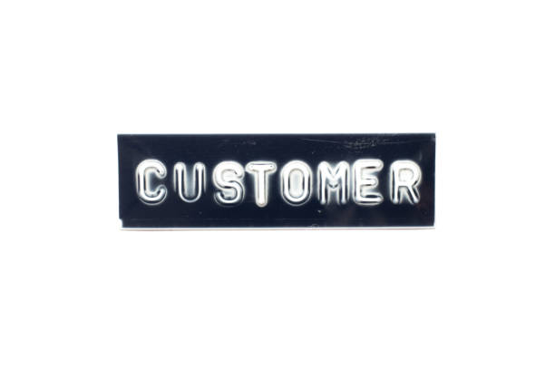 istock Embossed letter in word customer on black banner with white background 1304328297